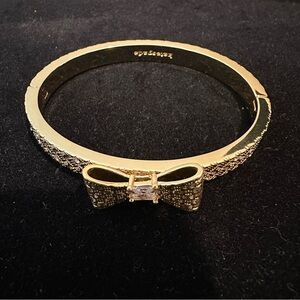 Kate spade Wrapped In a Bow Gold Bangle Bracelet with Center Crystal